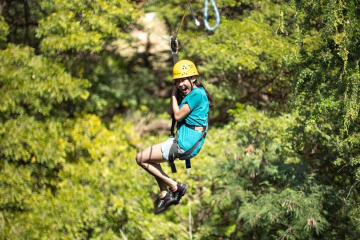 Zip your way to the lush jungle at Coral Crater Park